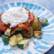 I love this potato, courgette & halloumi hash for breakfast, lunch or dinner! Topped with an easy tomato sauce & a poached egg it's a guaranteed winner.