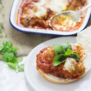 These cheesy baked meatball sandwiches are the perfect thing to feed a crowd! Serve for a party or just as a weeknight dinner the whole family will love.