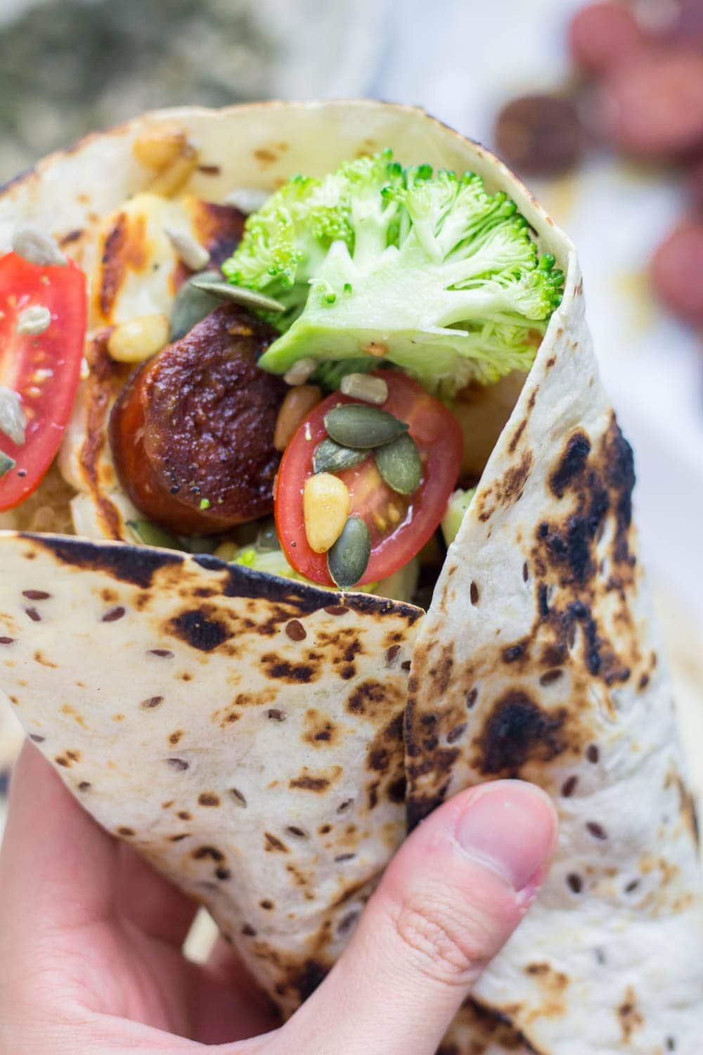 Halloumi & chorizo wraps are such a tasty lunch or dinner. The halloumi & chorizo are wrapped with a fresh broccoli slaw and a sprinkling of nuts and seeds.