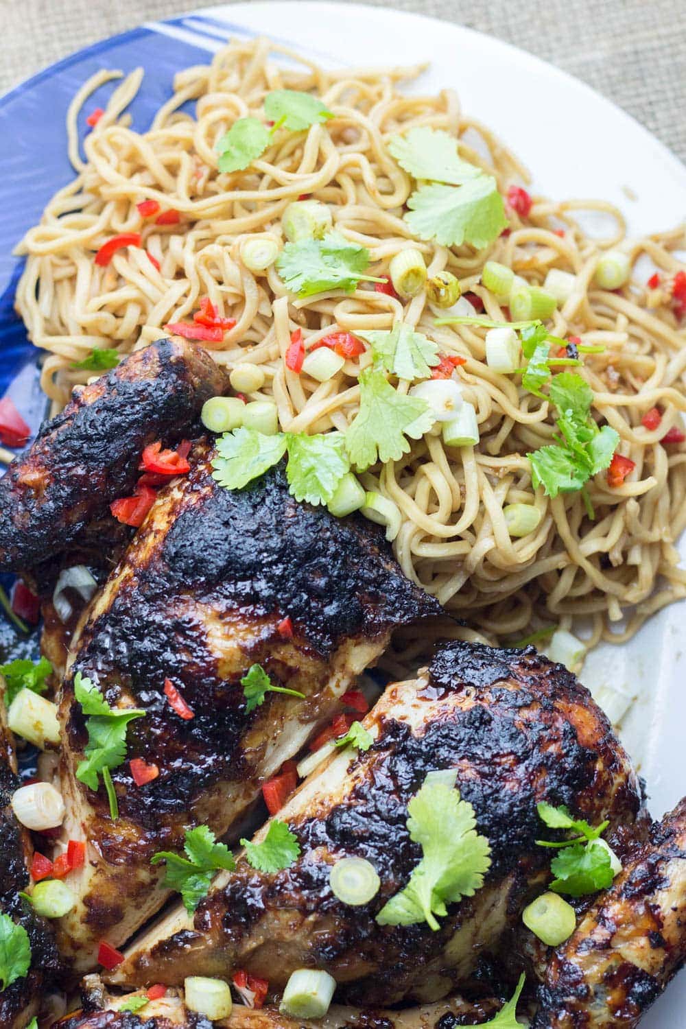 Asian Roasted Spatchcock Chicken with Noodle Salad. This Asian roasted spatchcock chicken is a great way to mix up a roast dinner. I love mine served with a refreshing noodle salad. #roastchicken #recipe #asianfood #spatchcock