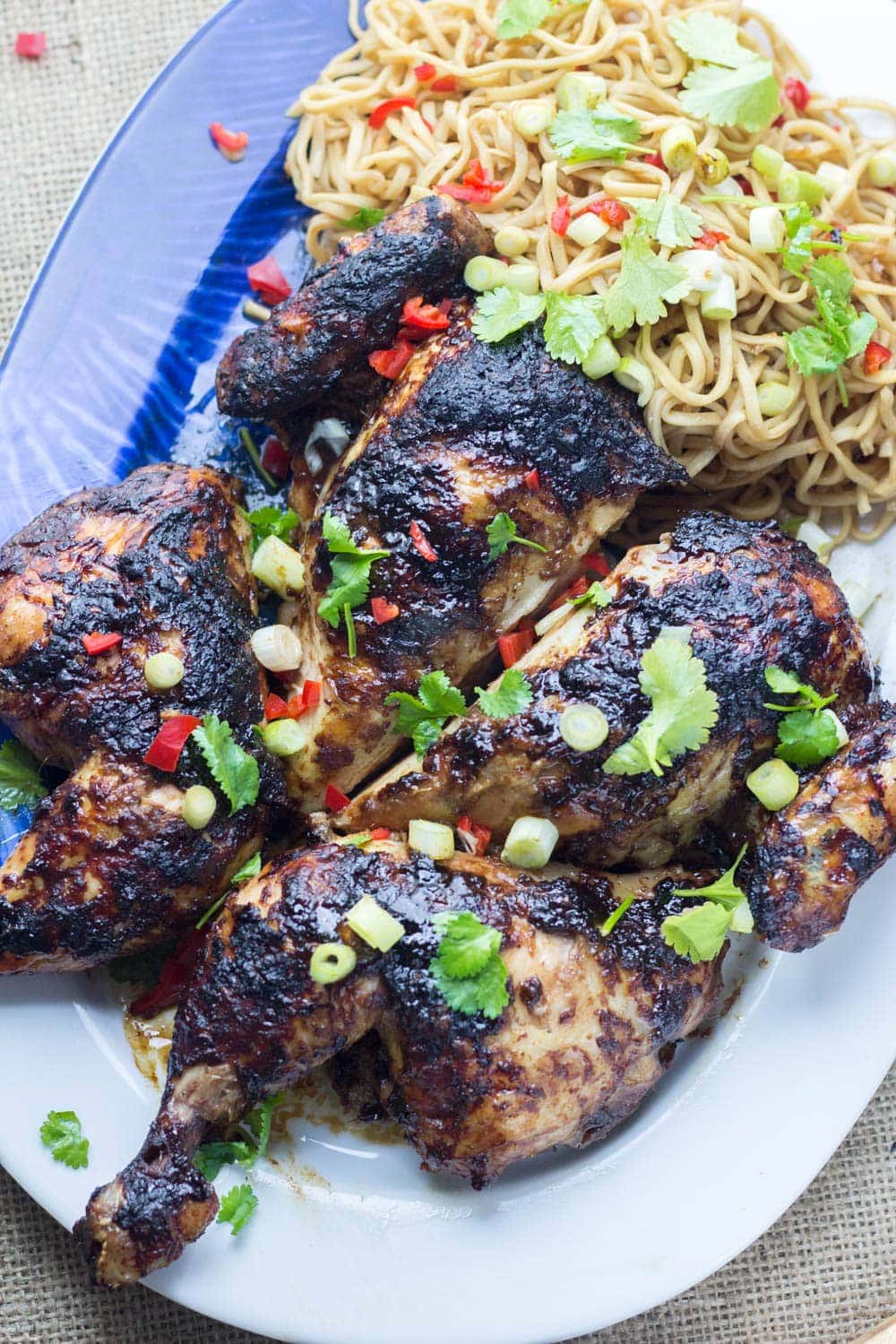 Asian Roasted Spatchcock Chicken with Noodle Salad. This Asian roasted spatchcock chicken is a great way to mix up a roast dinner. I love mine served with a refreshing noodle salad. #roastchicken #recipe #asianfood #spatchcock