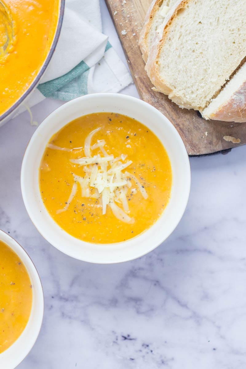 Chipotle Cheddar Spicy Sweet Potato Soup. This chipotle cheddar spicy sweet potato soup is the perfect thing to warm you up on a cold night. It's so easy to make too! #soup #recipe #sweetpotato 