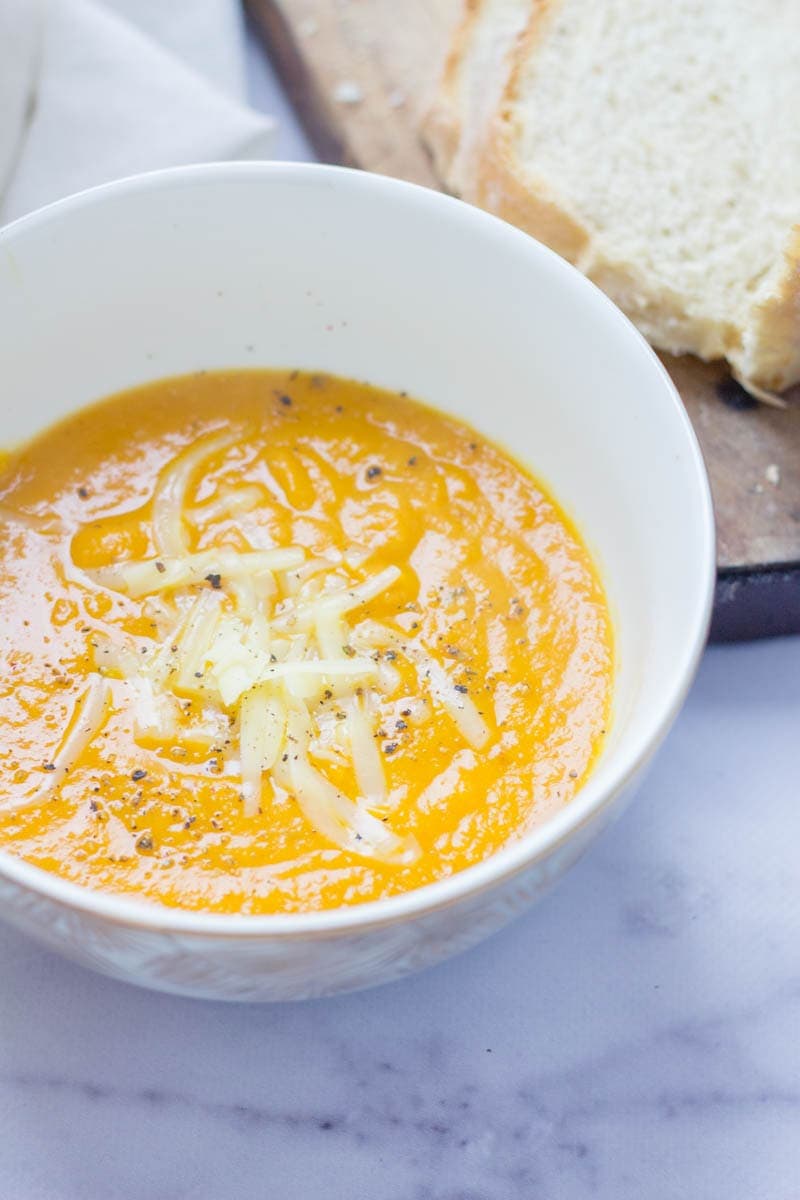 Chipotle Cheddar Spicy Sweet Potato Soup. This chipotle cheddar spicy sweet potato soup is the perfect thing to warm you up on a cold night. It's so easy to make too! #soup #recipe #sweetpotato 