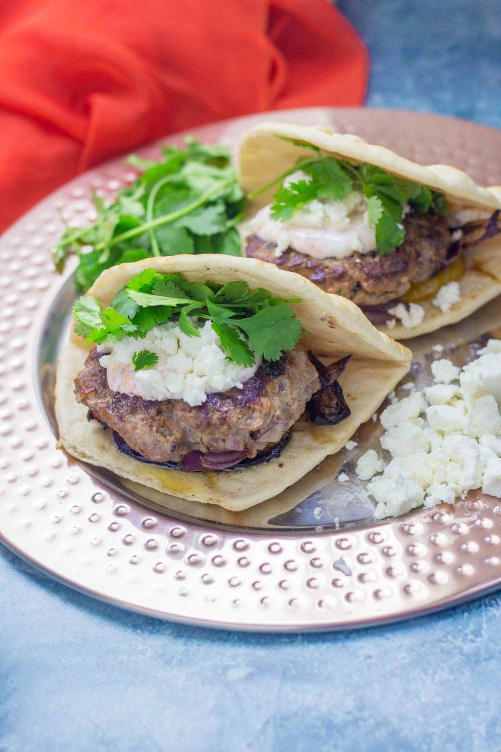If you need a quick weeknight dinner that's guaranteed to impress then this Moroccan lamb burger flatbread recipe is what you need! #lamb #burger #dinner #recipe 
