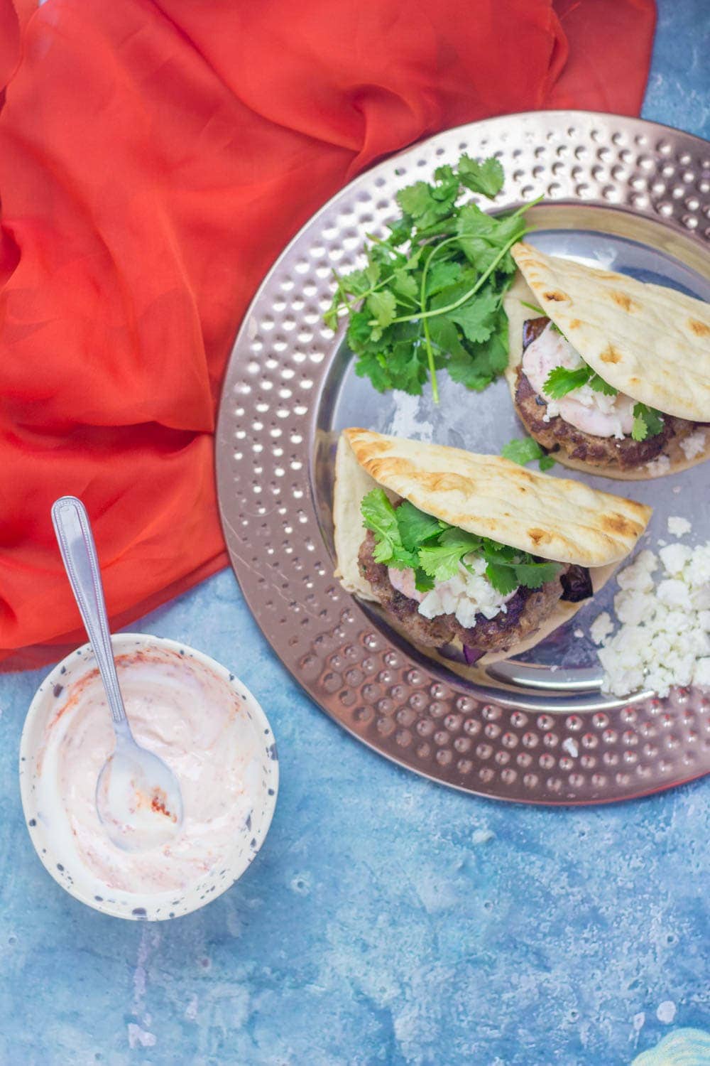 If you need a quick weeknight dinner that's guaranteed to impress then this Moroccan lamb burger flatbread recipe is what you need! #lamb #burger #dinner #recipe