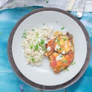 Overhead shot of aubergine in a cream bowl