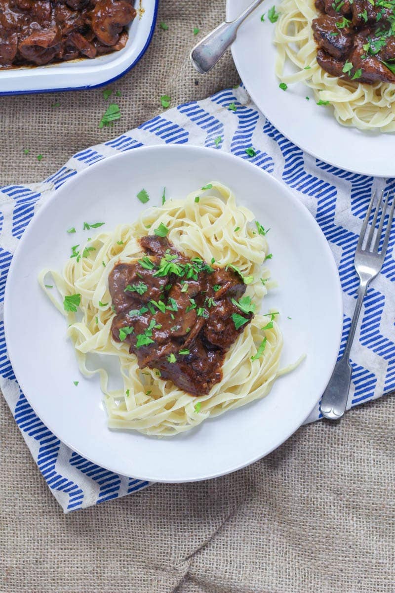 Easy Beef Stroganoff with Mushrooms. Make this easy beef stroganoff for a warming winter dinner. There's really nothing better than tender beef cooked with red wine and vegetables. #beefstroganoff #recipe #beef