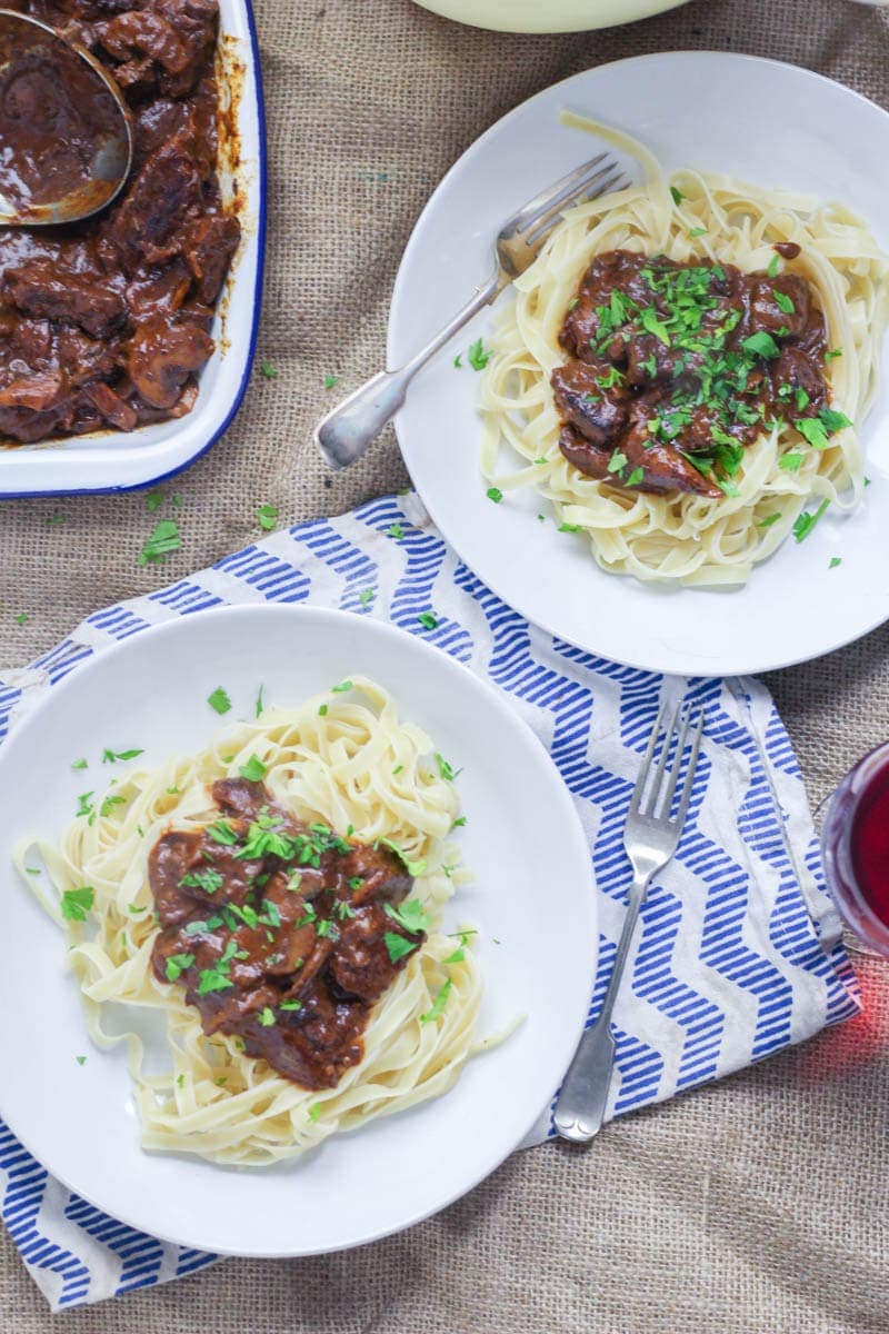 Easy Beef Stroganoff with Mushrooms. Make this easy beef stroganoff for a warming winter dinner. There's really nothing better than tender beef cooked with red wine and vegetables. #beefstroganoff #recipe #beef