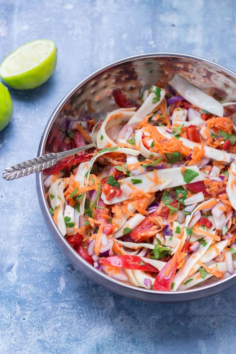 Thai Coconut Chicken Skillet with Asian Slaw. This Thai coconut chicken skillet is super sticky and full of flavour. Served with a refreshing Asian slaw it's the perfect weeknight dinner! #thaifood #recipe #skillet #chicken