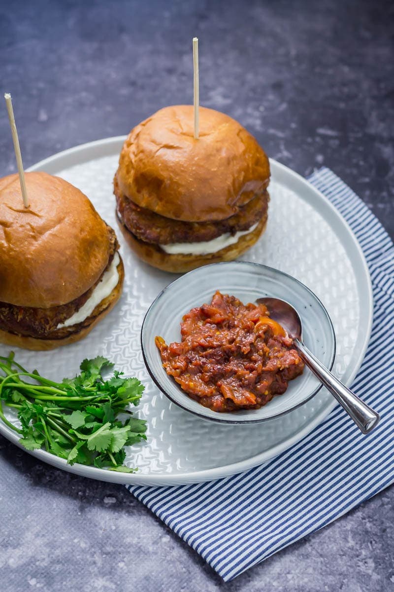 Two halloumi sandwiches with kasundi and herbs