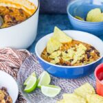 Mexican Rice & Vegetable Stew. Cheesy Mexican rice and vegetable tortilla stew is a tasty vegetarian weeknight dinner packed with beans, vegetables and spices! #mexican #rice #stew #vegetarian