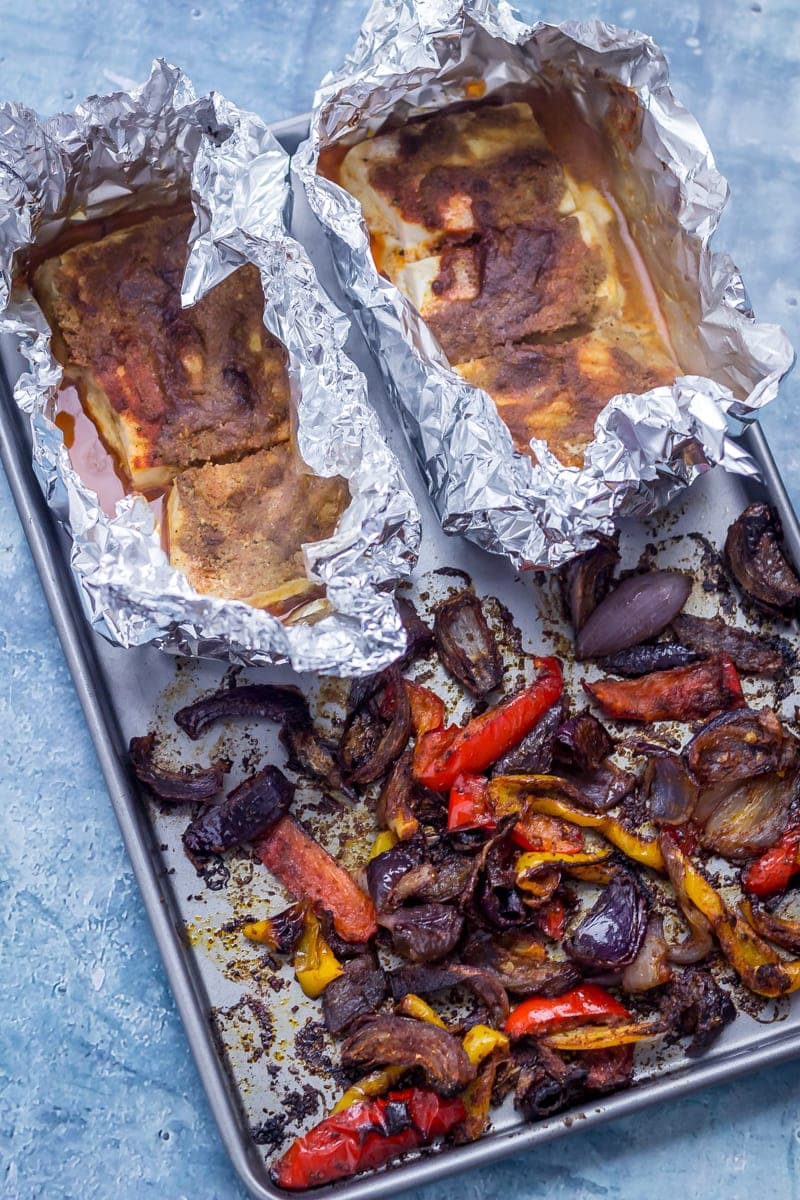 Sheet pan with fish, peppers and onion