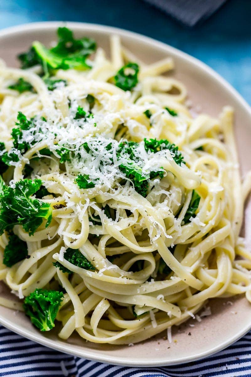 Close up of a plate of kale pasta