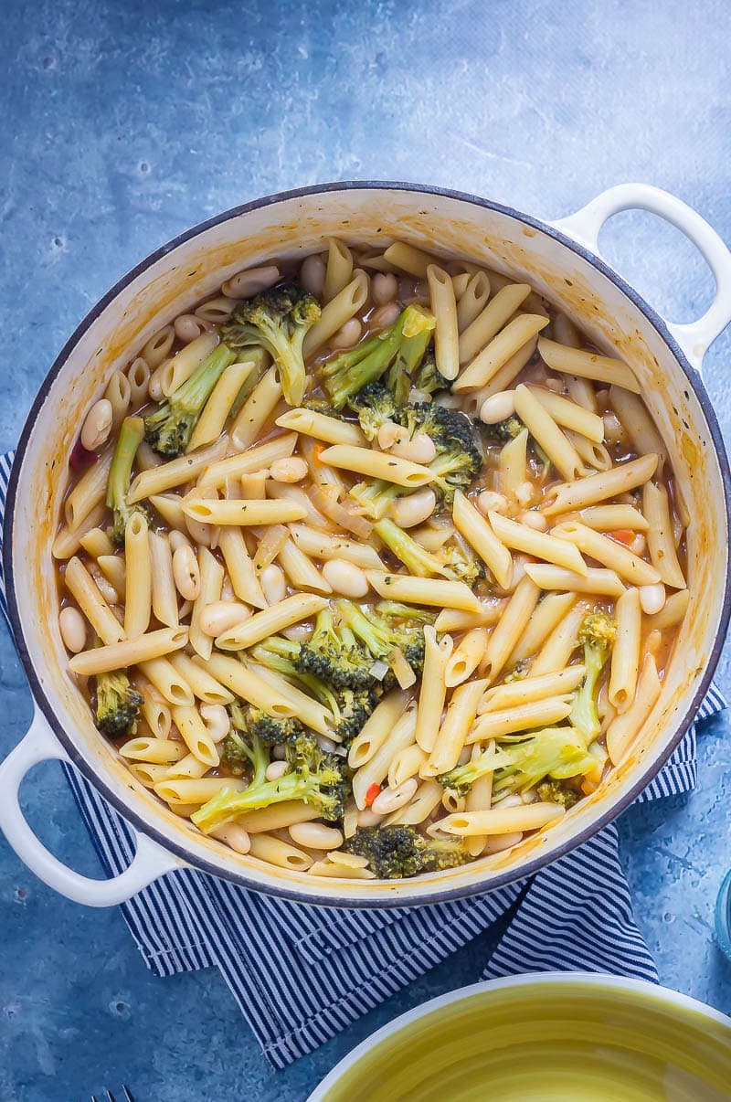 Broccoli and White Bean One Pot Pasta on a blue background