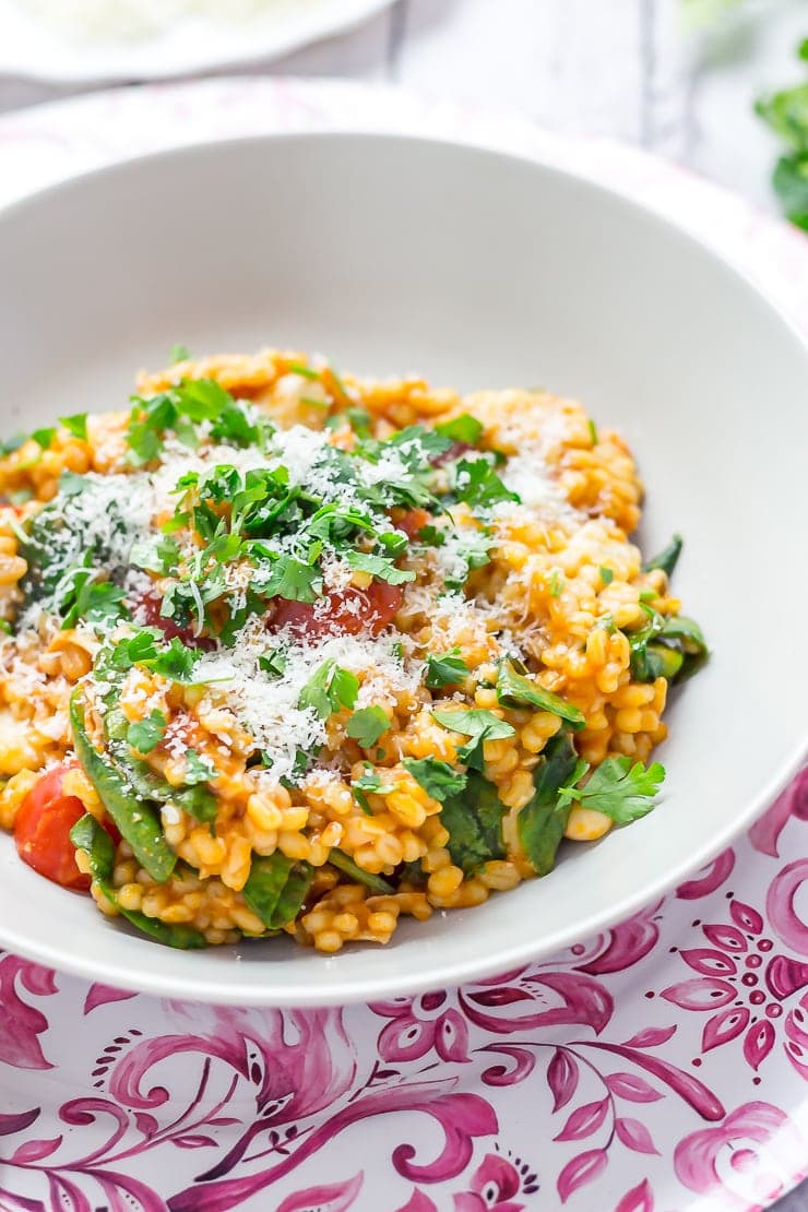 Bowl of One Pot Cheesy Pearl Barley with Tomatoes 