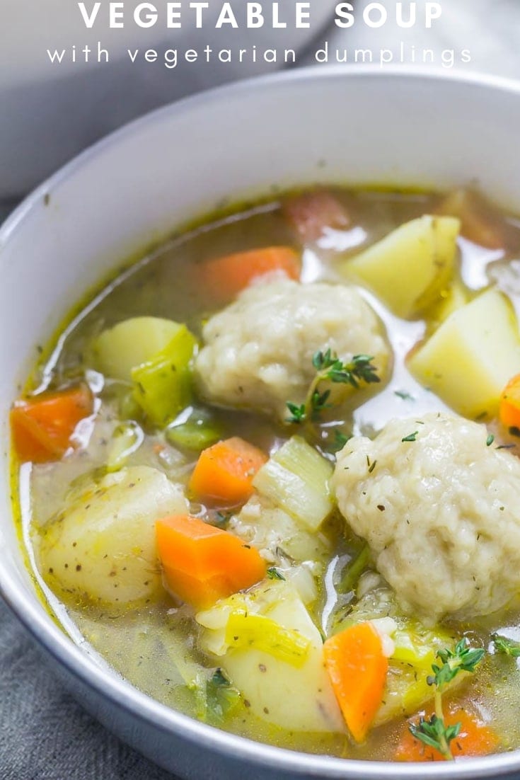 Pinterest image of vegetable soup with vegetarian dumplings with text overlay