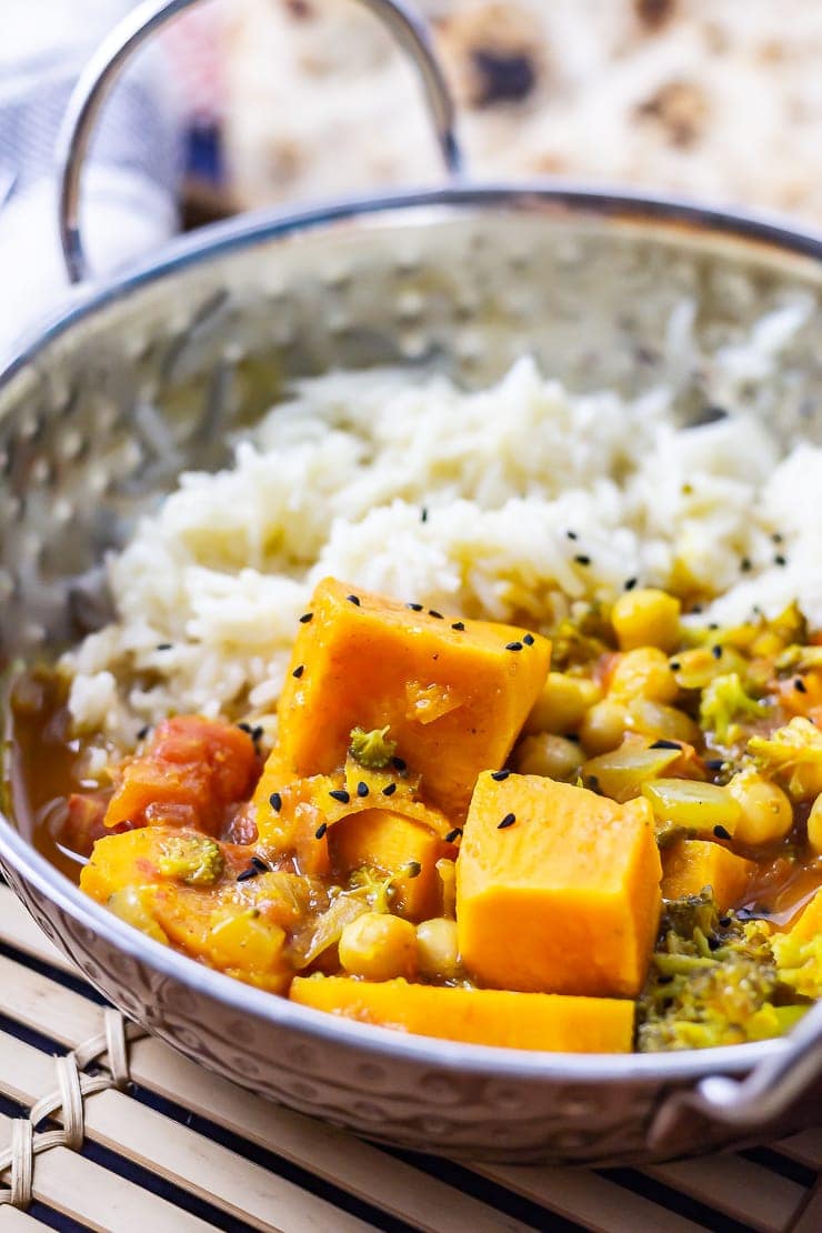 Close up of pressure cooker coconut curry in a bowl with rice