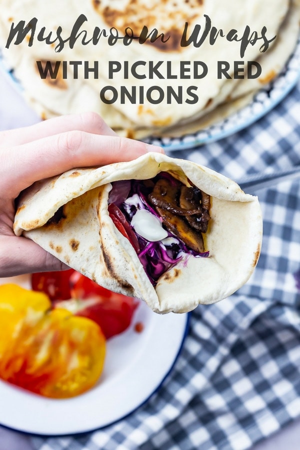 Sliced portobellos are cooked with onion in a mixture of spices to make these mushroom wraps topped with crunchy red cabbage and pickled red onions. #vegetarian #mushrooms #mushroomwrap #healthy #thecookreport