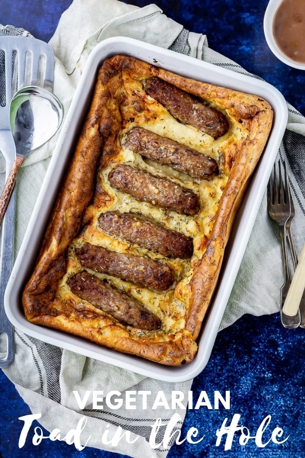 Overhead shot of vegetarian toad in the hole with text overlay