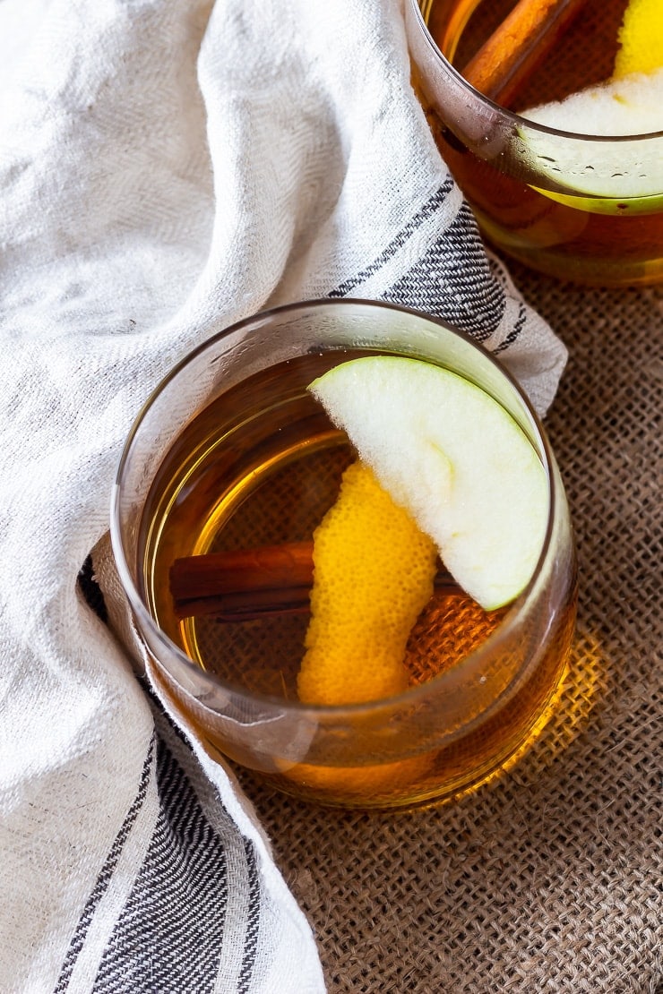 Overhead shot of winter spiced apple cocktail with rum 