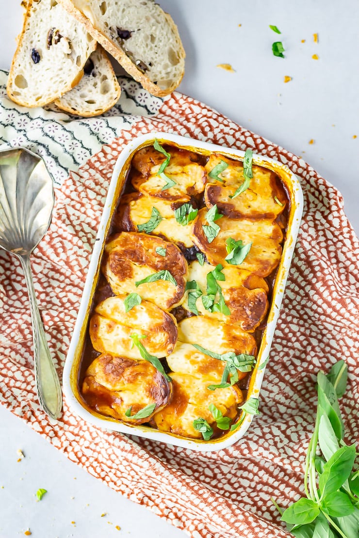 Overhead shot of halloumi bake on a patterned cloth