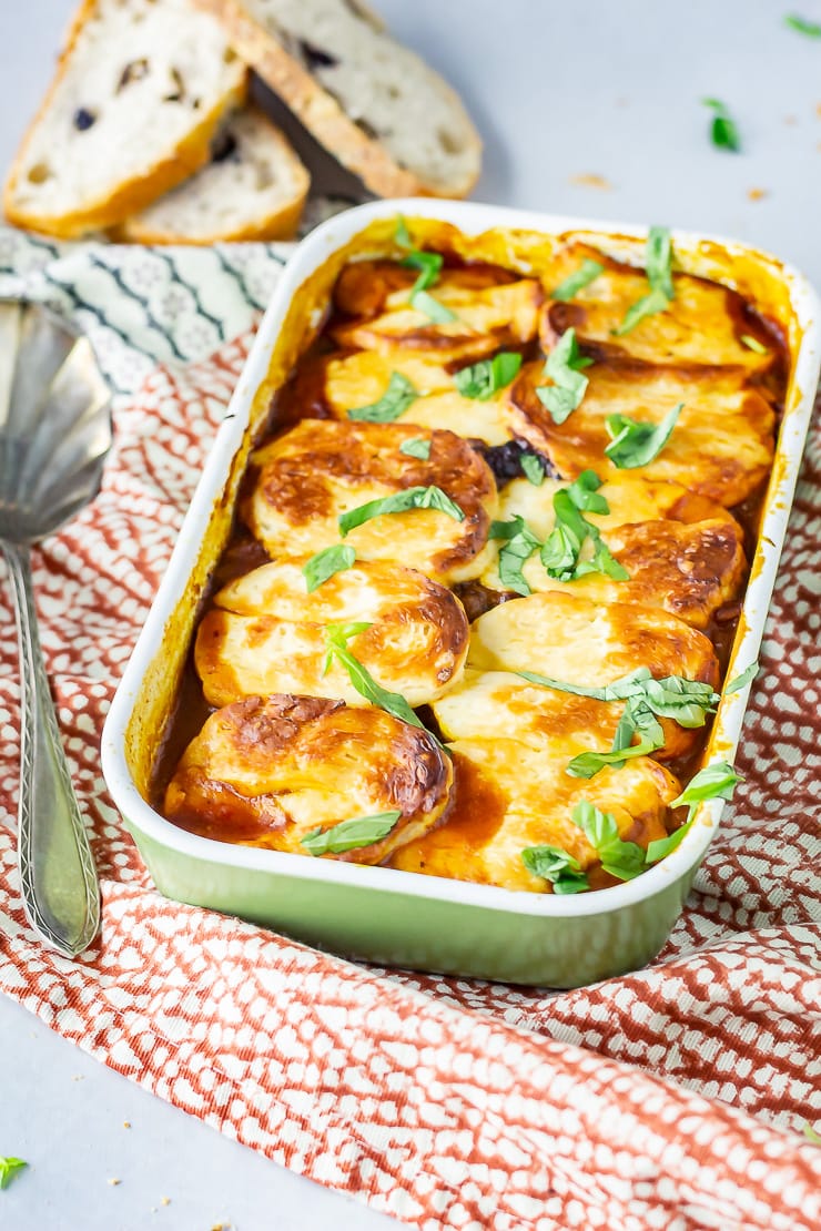 Halloumi bake in a green baking dish