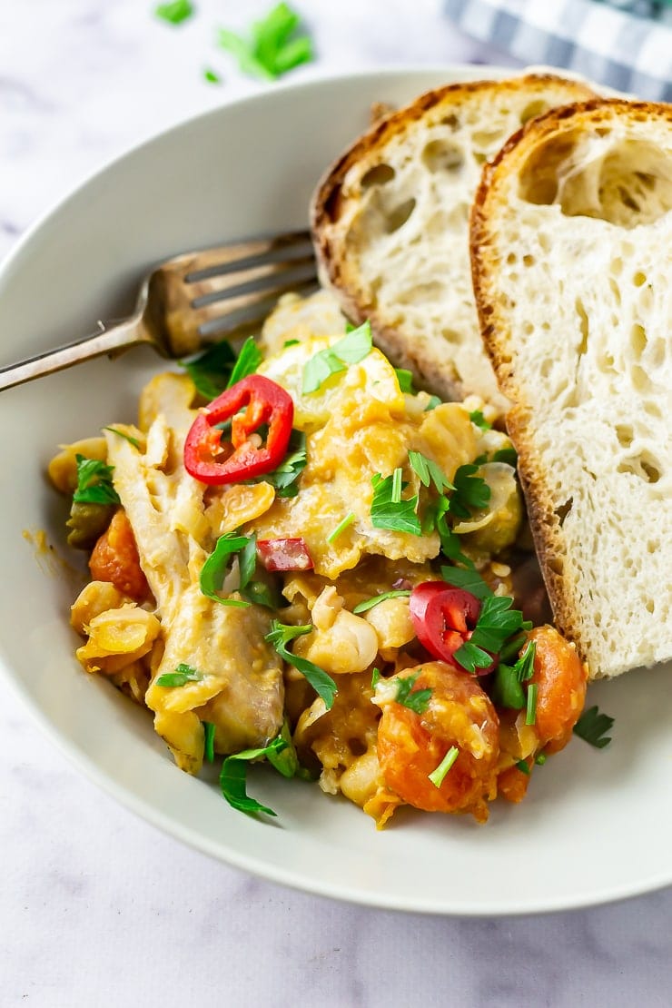 Bowl of fish stew with bread