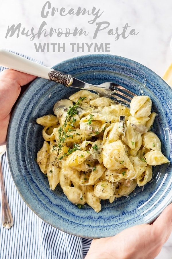 Pinterest image for creamy mushroom pasta with text overlay