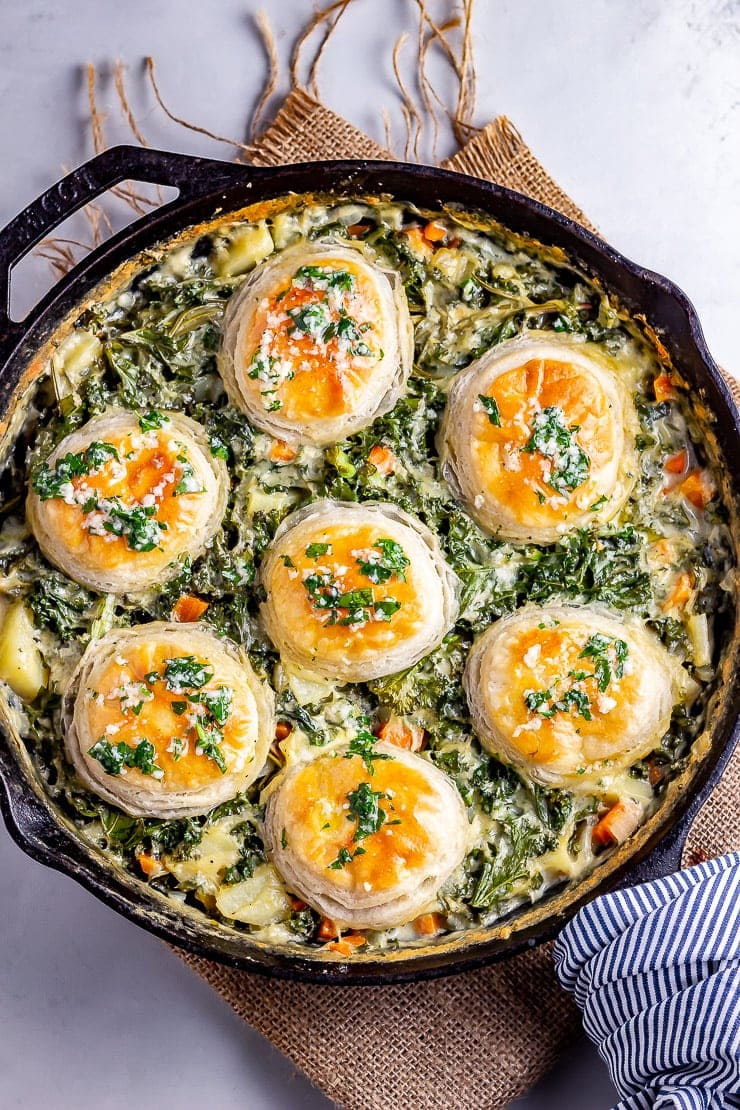 Overhead shot of skillet vegetable pie on a hessian mat