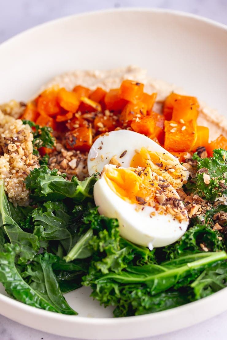 Close up of breakfast bowl with a boiled egg