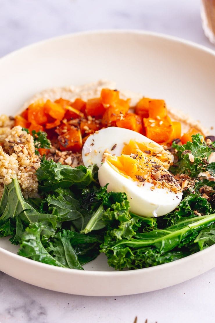 Vegetarian breakfast bowl with egg and butternut squash