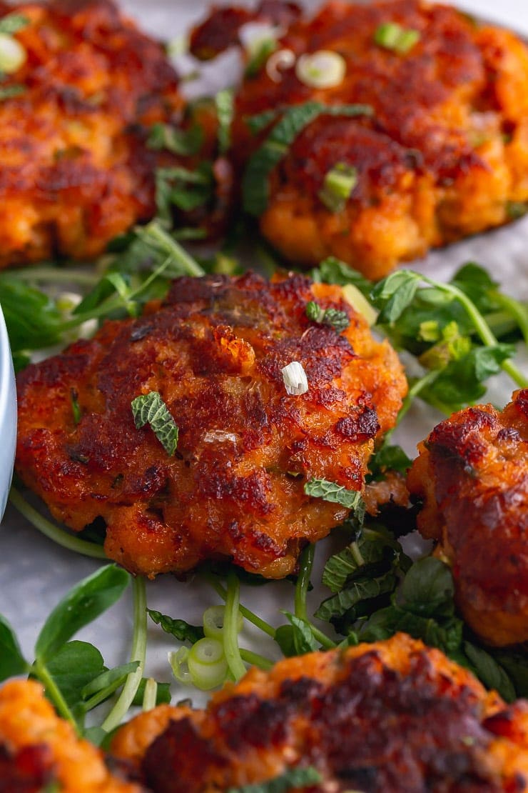 Close up of a Thai fish cakes with greens