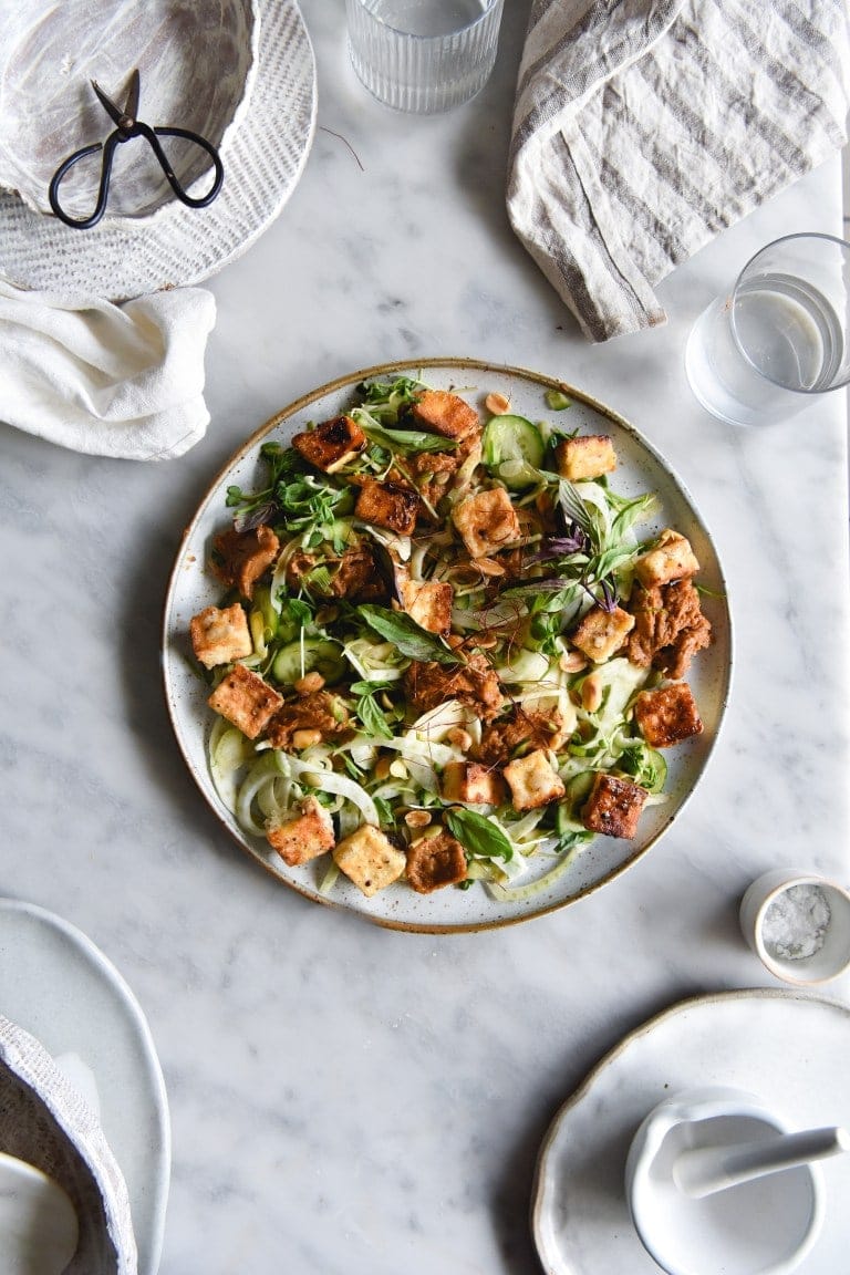 Salt and pepper tofu on a marble background