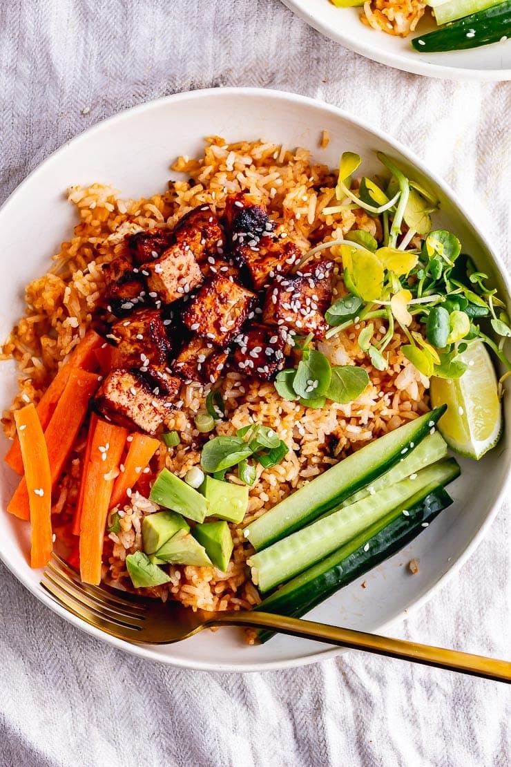 Overhead shot of spicy rice bowl topped with Korean tofu