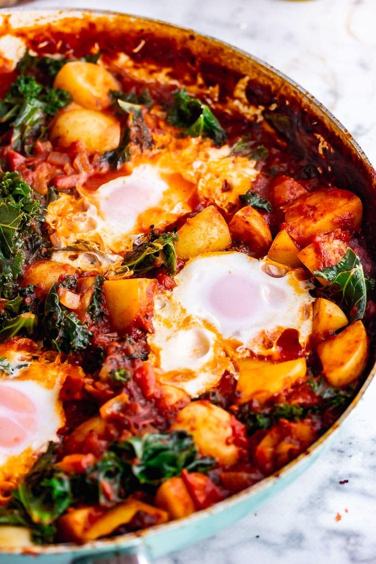 Close up of chipotle eggs and potatoes with kale