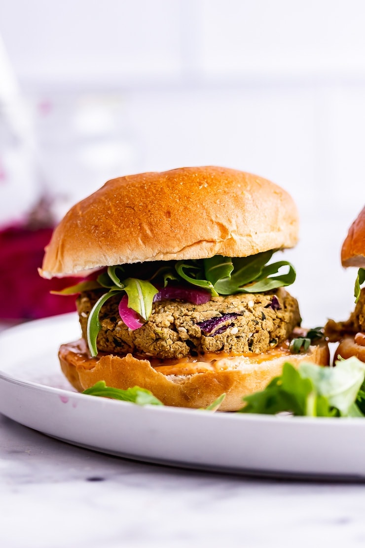 Side on shot of a falafel burger with rocket