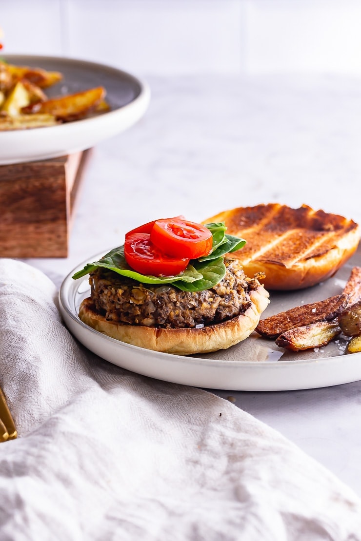 Side on shot of mushroom burger on a marble surface