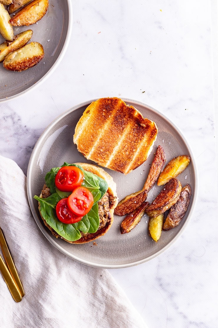 Overhead shot mushroom burger on a marble surface 