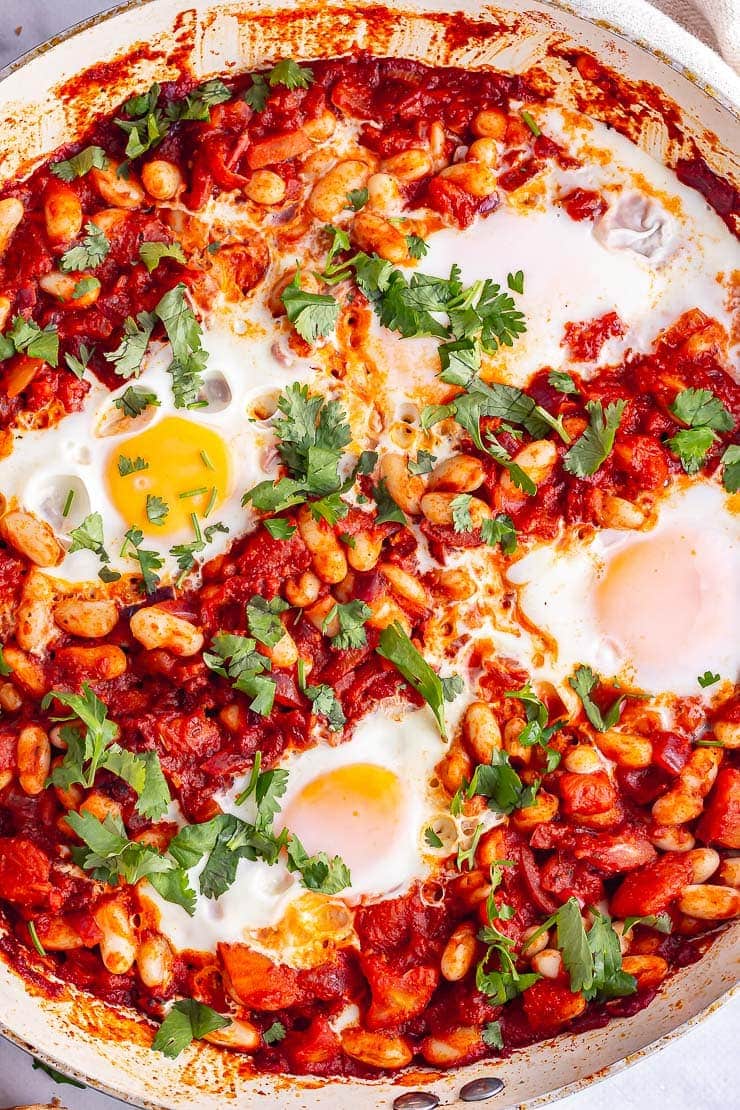 Overhead shot of spicy breakfast skillet with herbs