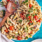 Close up of halloumi pasta on a grey plate