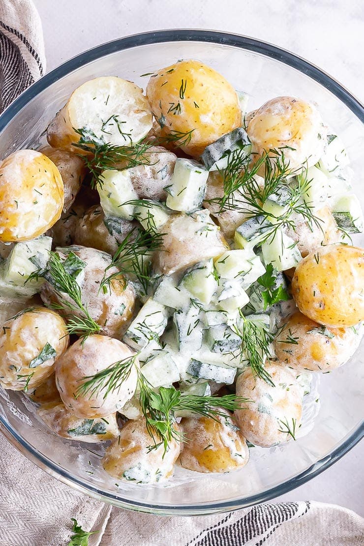 Overhead shot of healthy potato salad with cucumber 