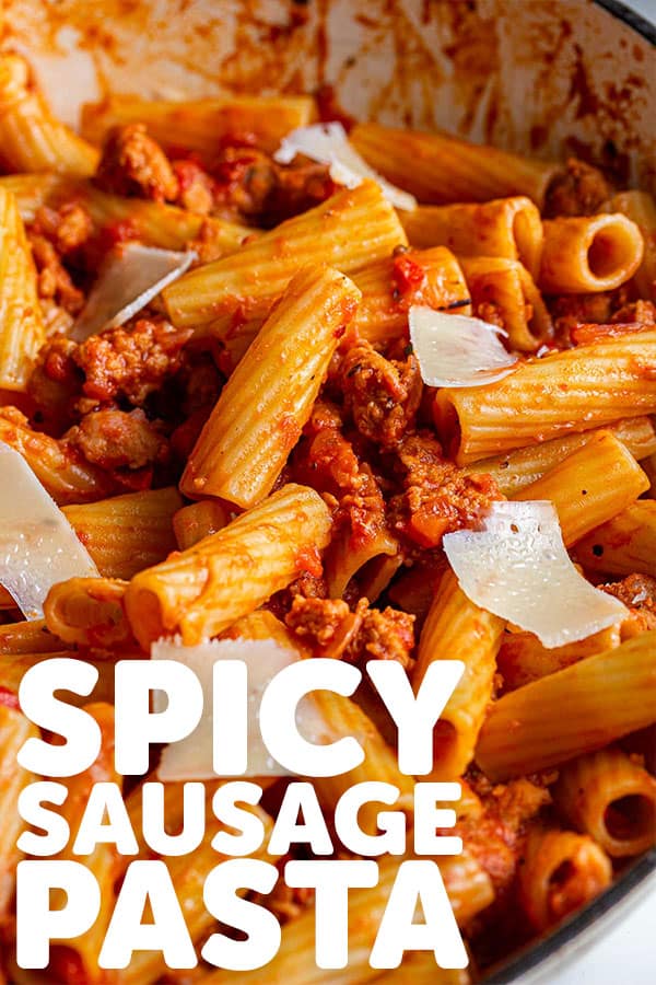 Pinterest image for spicy sausage pasta with text overlay