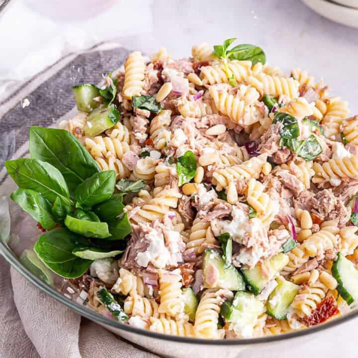 Close up of tuna pasta salad in a white bowl