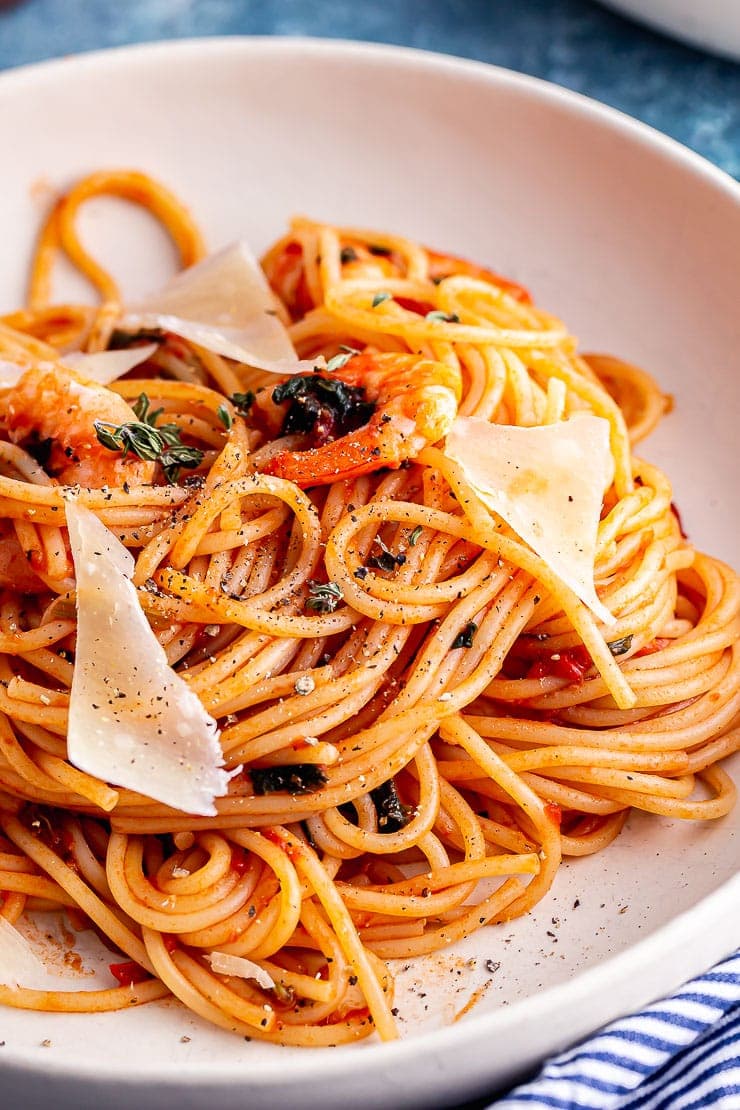 Close up of prawn spaghetti with parmesan 