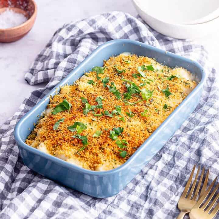 Blue baking dish of truffle mac and cheese