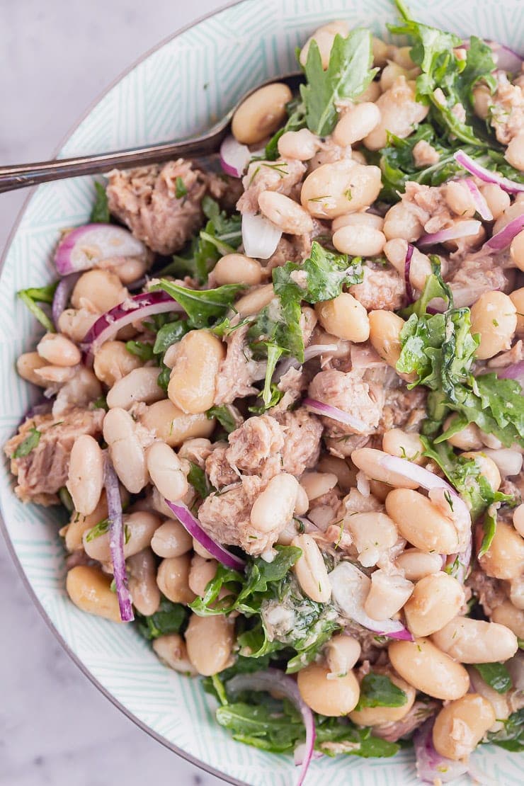 Close up of tuna fish salad with rocket and beans