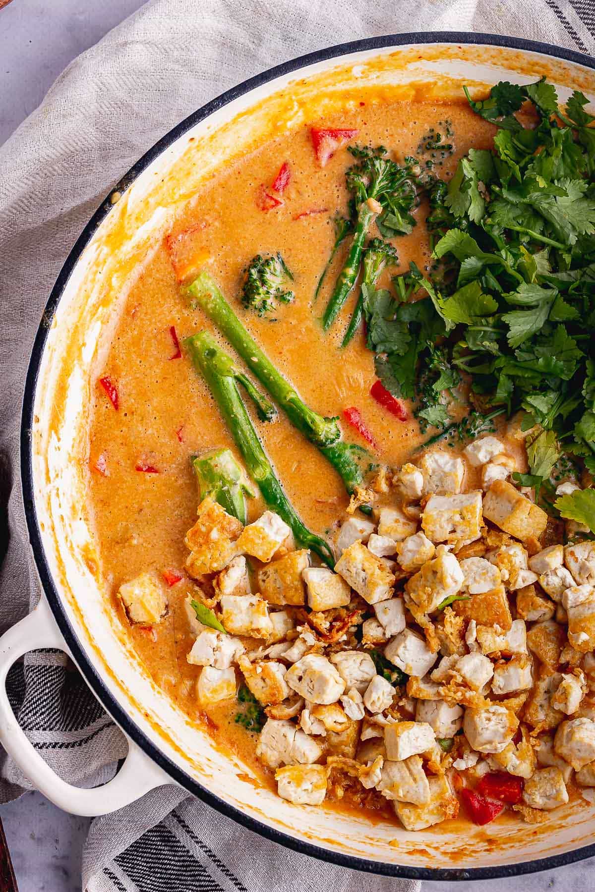 Overhead shot of creamy curry with tofu and veggies