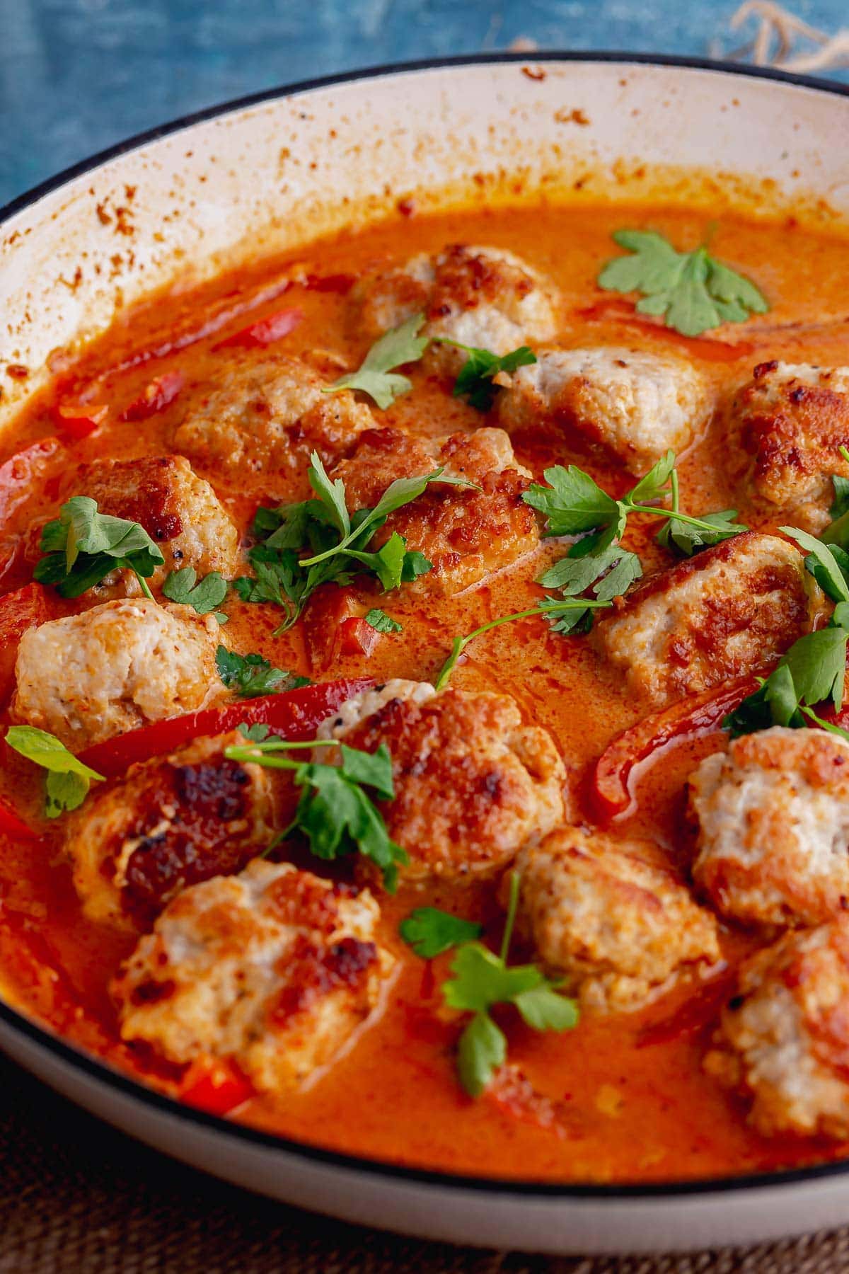 White dish of turkey meatball curry 