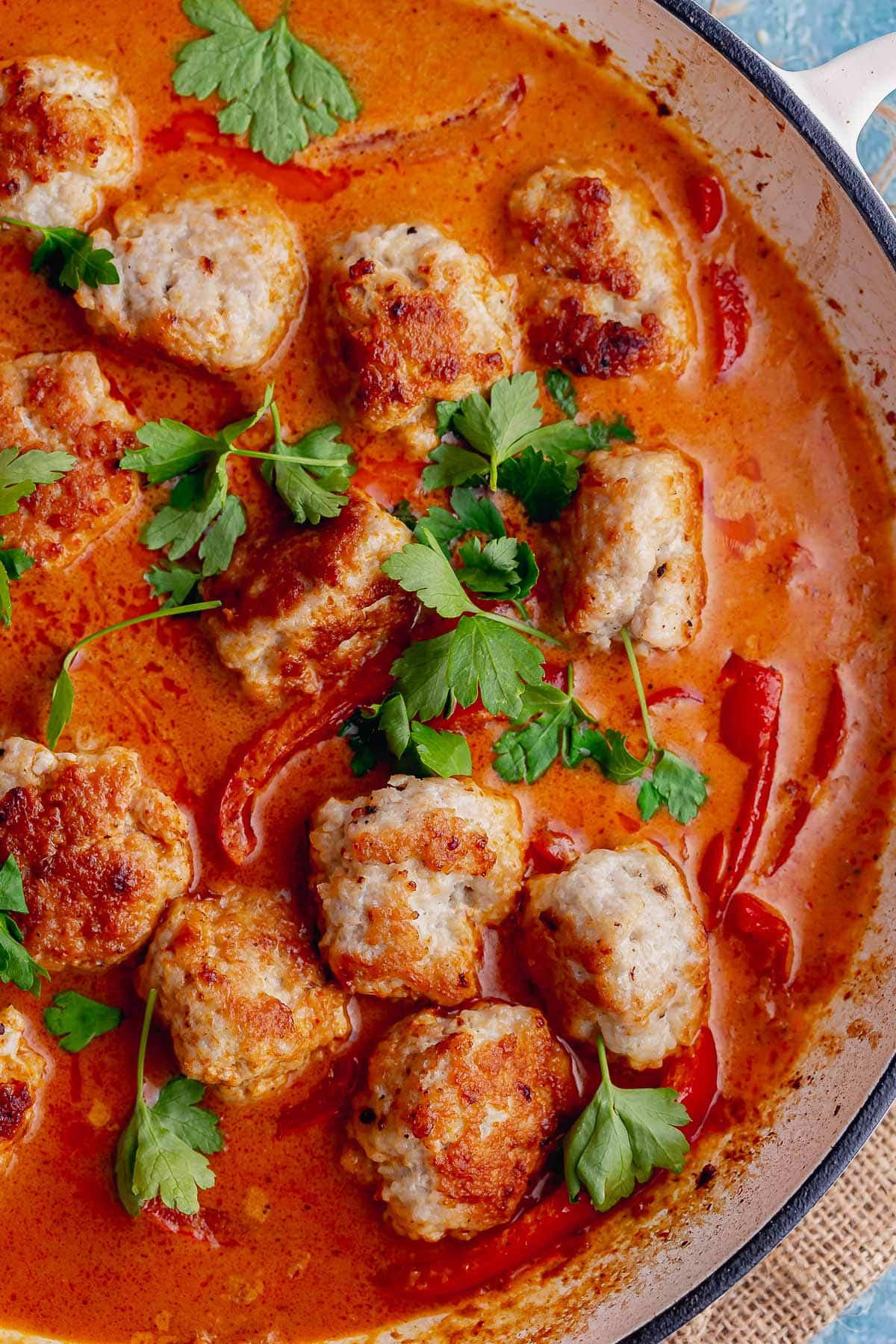 Close up of Thai meatball curry with coriander