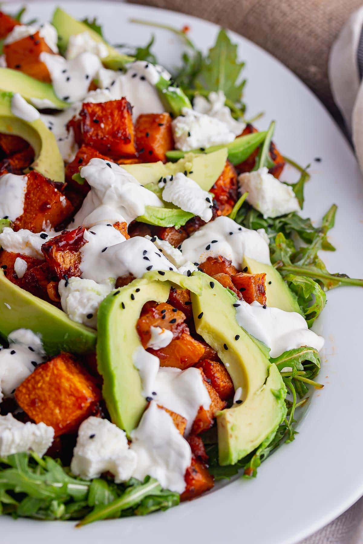 Close up of squash salad with avocado